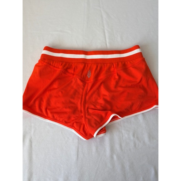 Free People Movement Orange  Dolphin Shorts White Trim Womens Size Medium new - Picture 2 of 8